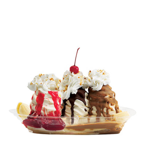 ice cream sundae in dish with toppings